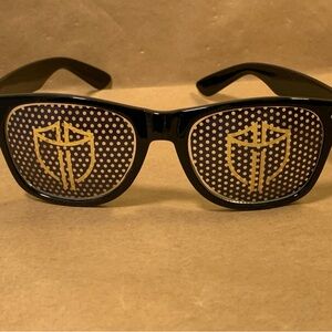 Black Sunglasses with Gold Shield Design Golf Presidents Club tournament 2025